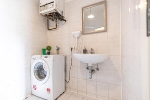 Hair dryer, towels, soap, shampoo