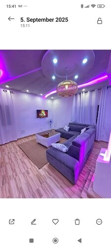 (Your stylish temporary home in Lomé)?