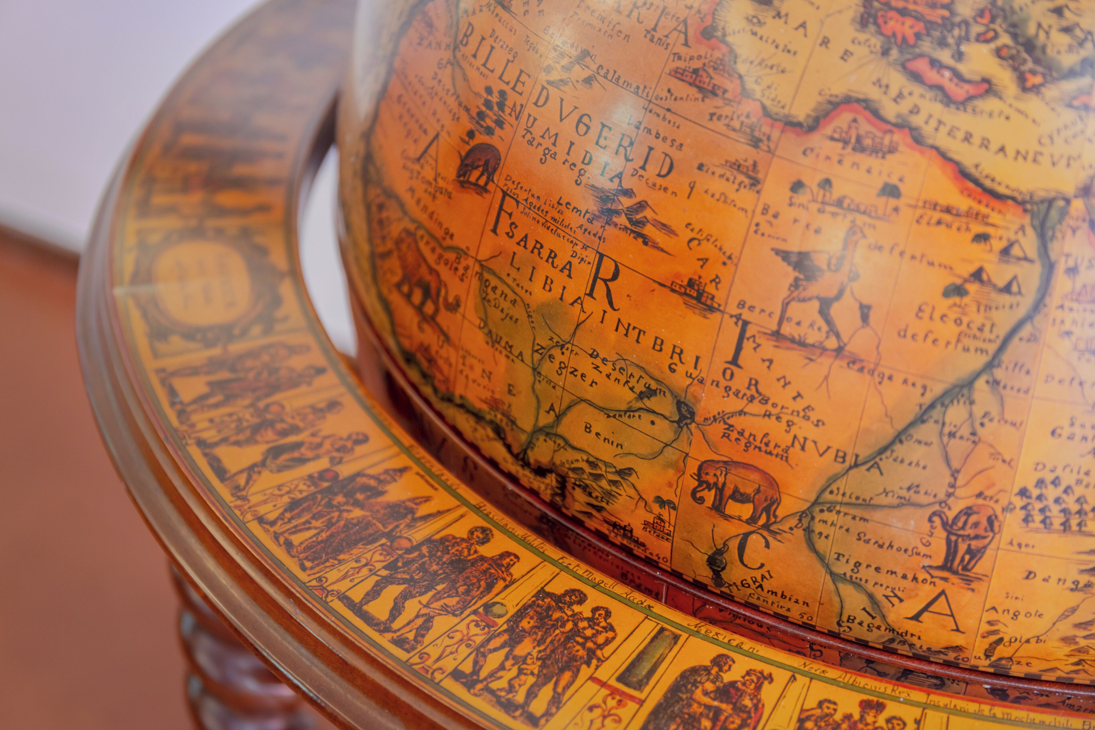 A globe with detailed maps and illustrations.