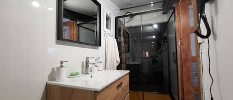 Hair dryer, towels, soap, toilet paper