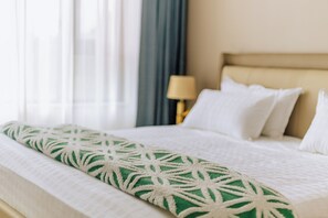 Deluxe eenpersoonskamer, balkon, uitzicht op tuin | Geluiddichte muren, een strijkplank/strijkijzer, gratis wifi