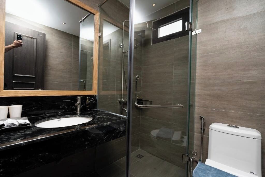 Hair dryer, slippers, towels, soap