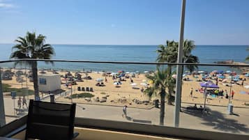 On the beach, sun loungers