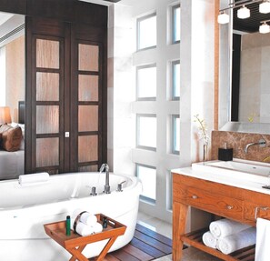 Jetted tub, hair dryer, towels, soap