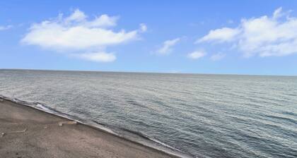 Beachhouse Nature Retreat with Firepit and Game Room