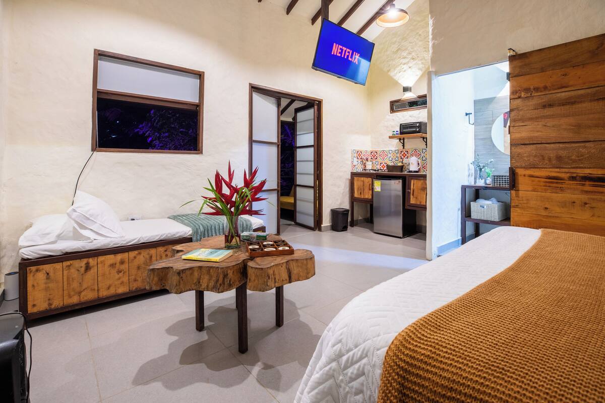 Suite Deluxe, vistes al jardí | Roba de llit hipoal·lergògena i minibar