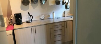 Lovely apartment on 2 levels of 125 sqm. in a nature area. Walking distance to S-trains and buses