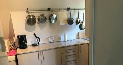 Lovely apartment on 2 levels of 125 sqm. in a nature area. Walking distance to S-trains and buses