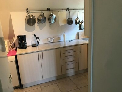 Lovely apartment on 2 levels of 125 sqm. in a nature area. Walking distance to S-trains and buses