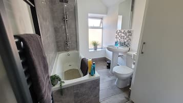 Hair dryer, towels, soap, shampoo