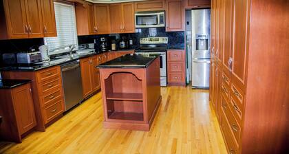 Spacious 5-bedroom villa with AC and fitness room in enjoyable Gatineau