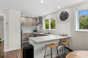 Fridge, microwave, dishwasher, coffee/tea maker