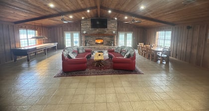 Private Lake Lodge on 104 acres with bar, pool table, shuffle board and more!