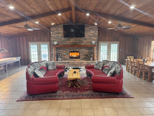 Private Lake Lodge on 104 acres with bar, pool table, shuffle board and more!
