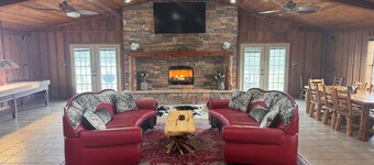 Private Lake Lodge on 104 acres with bar, pool table, shuffle board and more!