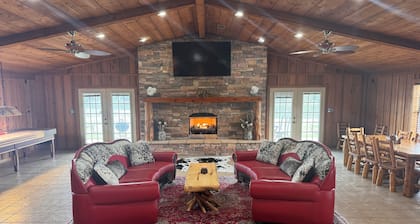 Private Lake Lodge on 104 acres with bar, pool table, shuffle board and more!