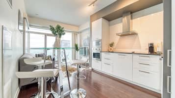 Business Condo, Balcony | Blackout drapes, iron/ironing board, free WiFi