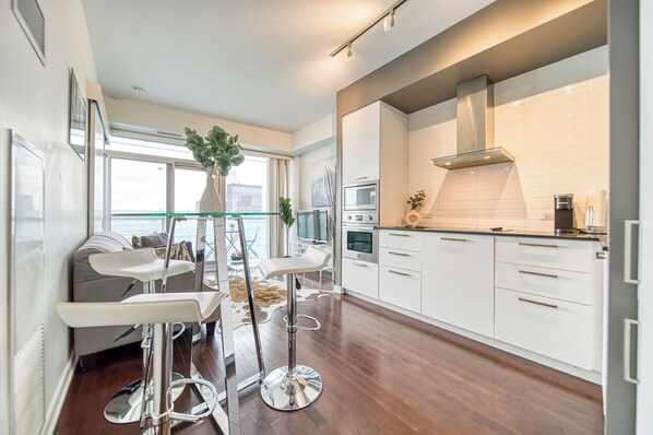 Business Condo, Balcony | Blackout drapes, iron/ironing board, free WiFi