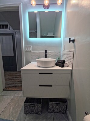 Hair dryer, towels, soap, toilet paper