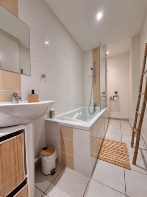 Shower, hair dryer, towels, soap