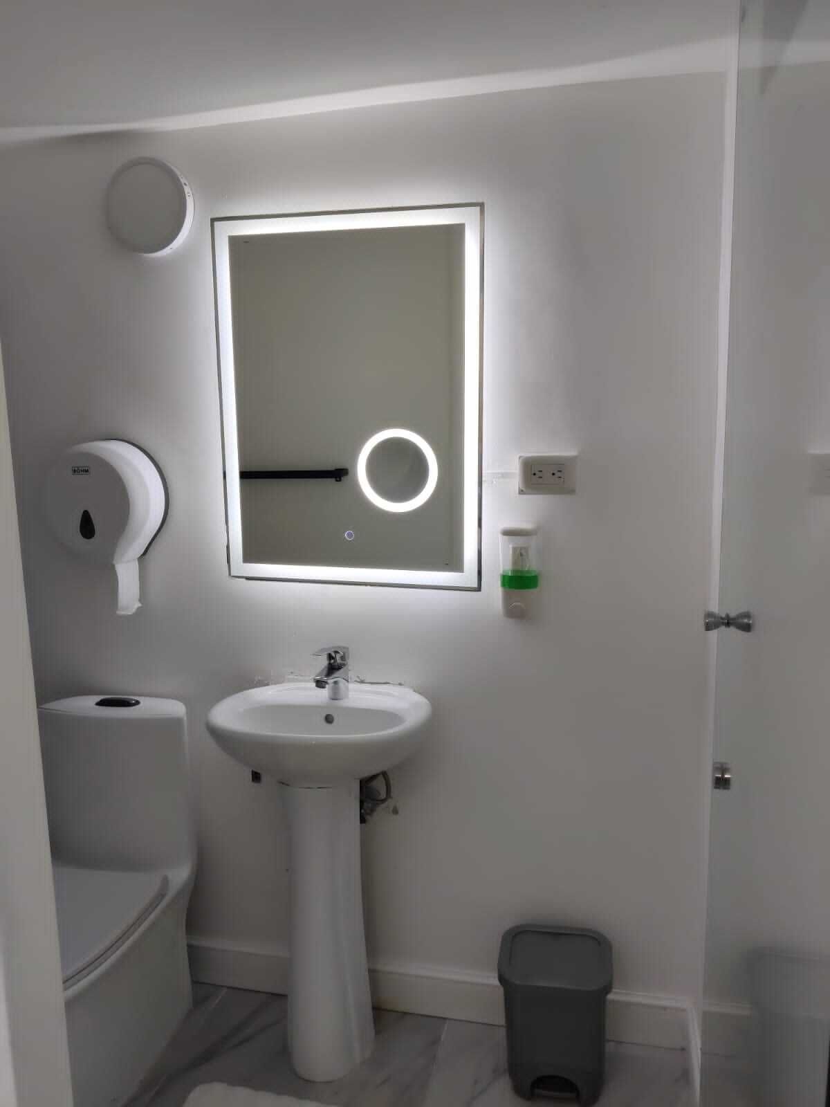 Shower, towels, soap, toilet paper