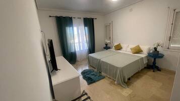 4 slaapkamers, een strijkplank/strijkijzer, wifi