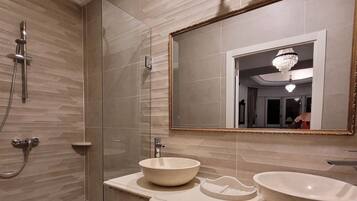 Standard Double Room | Bathroom | Shower, towels, soap, shampoo