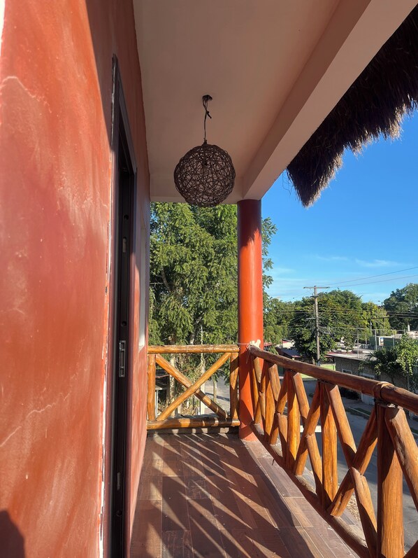 Deluxe Suite, Balcony, Garden View | Terrace/patio