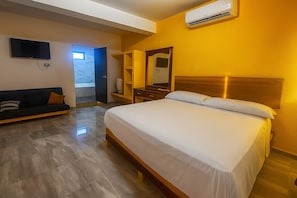 Deluxe Suite, Balcony, Garden View | Iron/ironing board, free WiFi