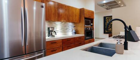 Microwave, stovetop, coffee/tea maker, toaster