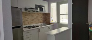 Fridge, microwave, oven, stovetop