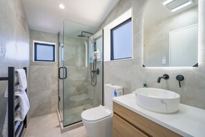 Shower, hair dryer, towels, soap