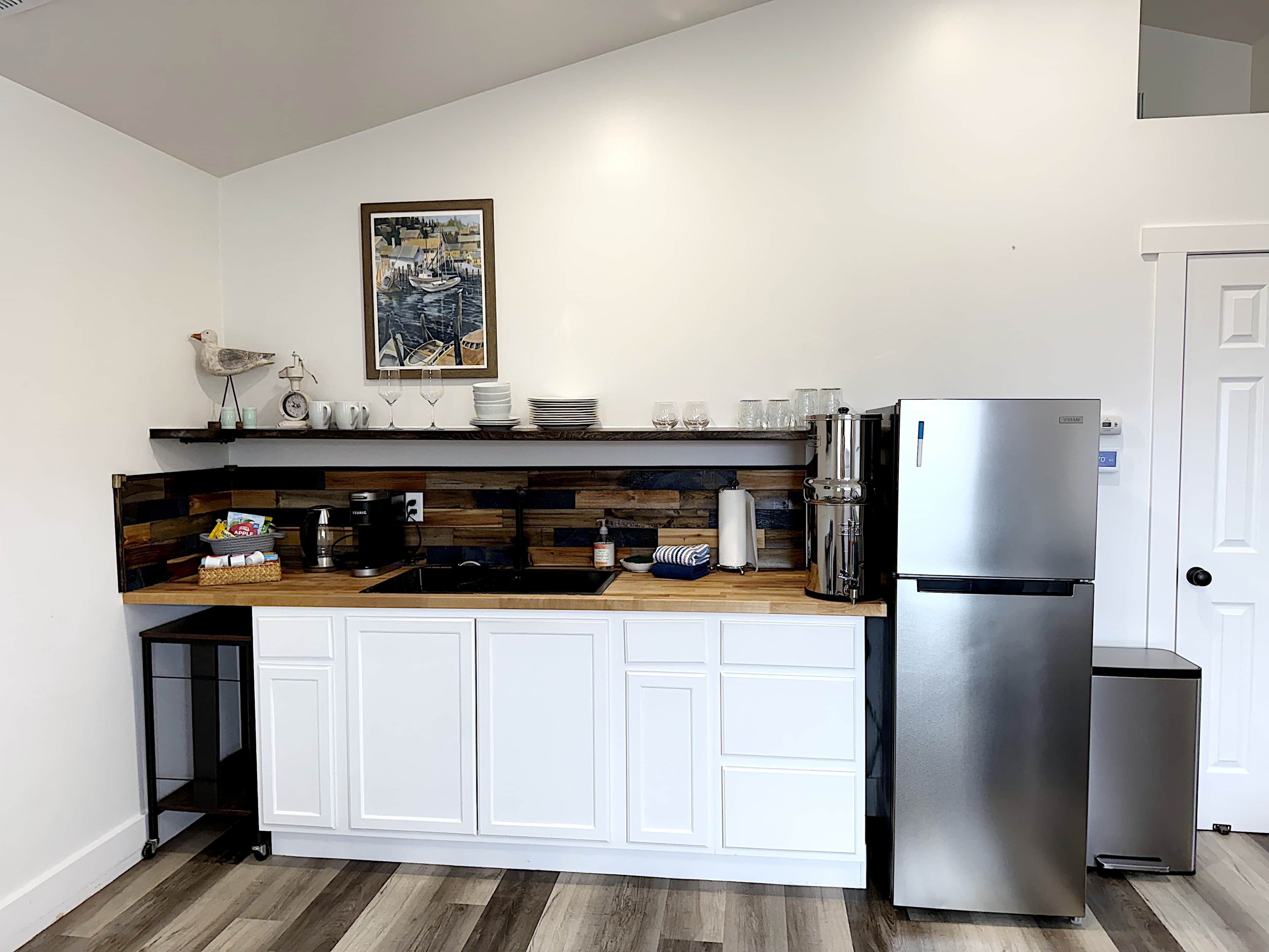 Fridge, microwave, coffee/tea maker, toaster