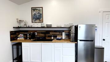 Fridge, microwave, coffee/tea maker, toaster