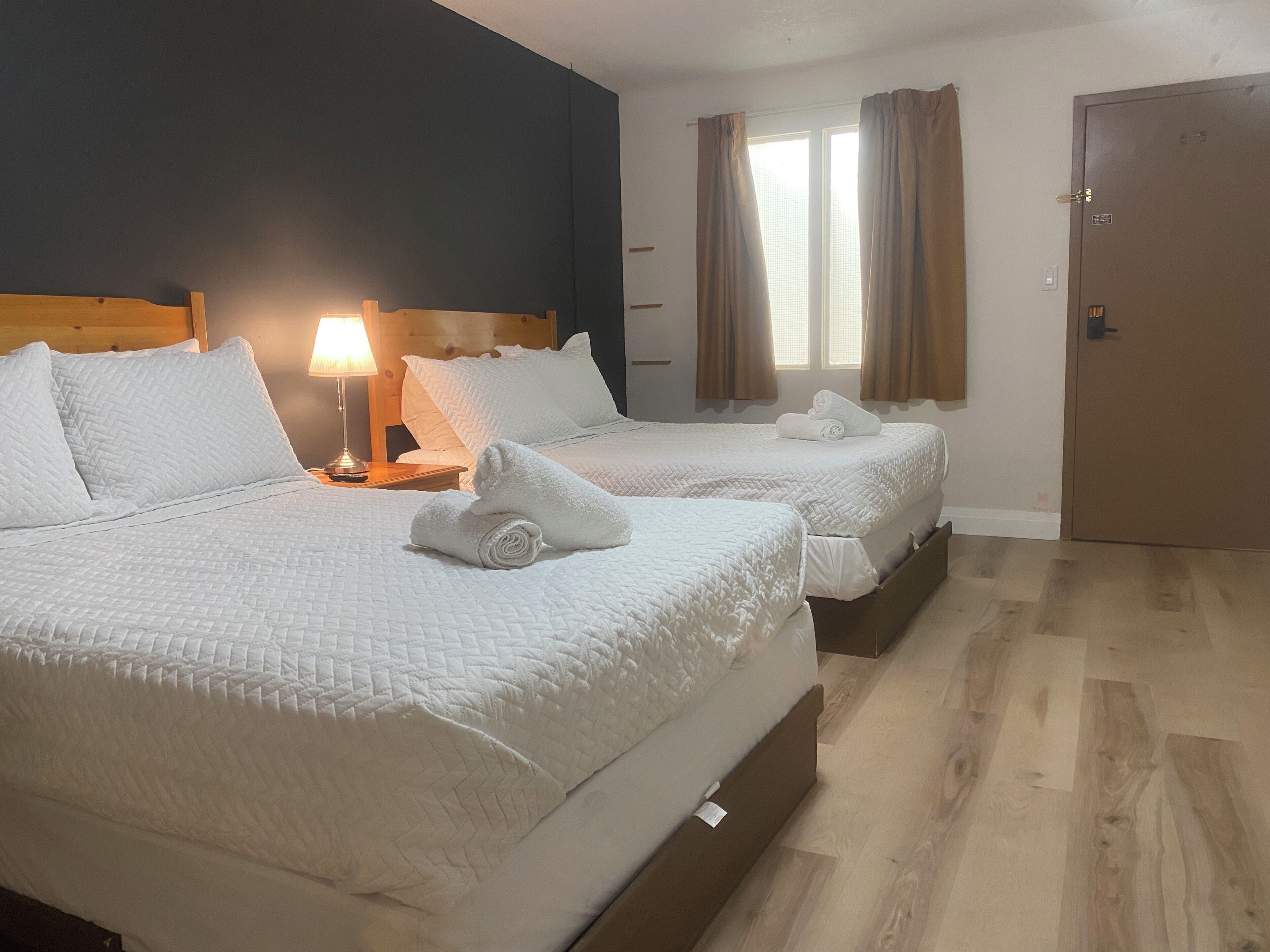 Deluxe Room, 2 Double Beds | Laptop workspace, free WiFi