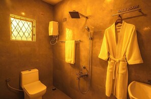 Regadera, toallas, jabón, papel de baño