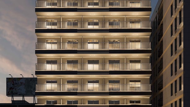 A multi-story hotel with balconies, a ground-level entrance, and a large billboard. - b&Tengachaya (Osaka)