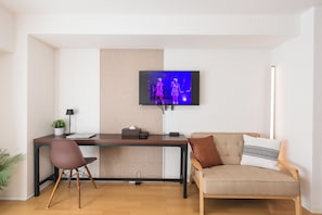 Family Room, Balcony, City View | Laptop workspace, blackout drapes, iron/ironing board, free WiFi