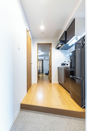 Family Room, Balcony, City View | Pillowtop beds, laptop workspace, blackout drapes, iron/ironing board