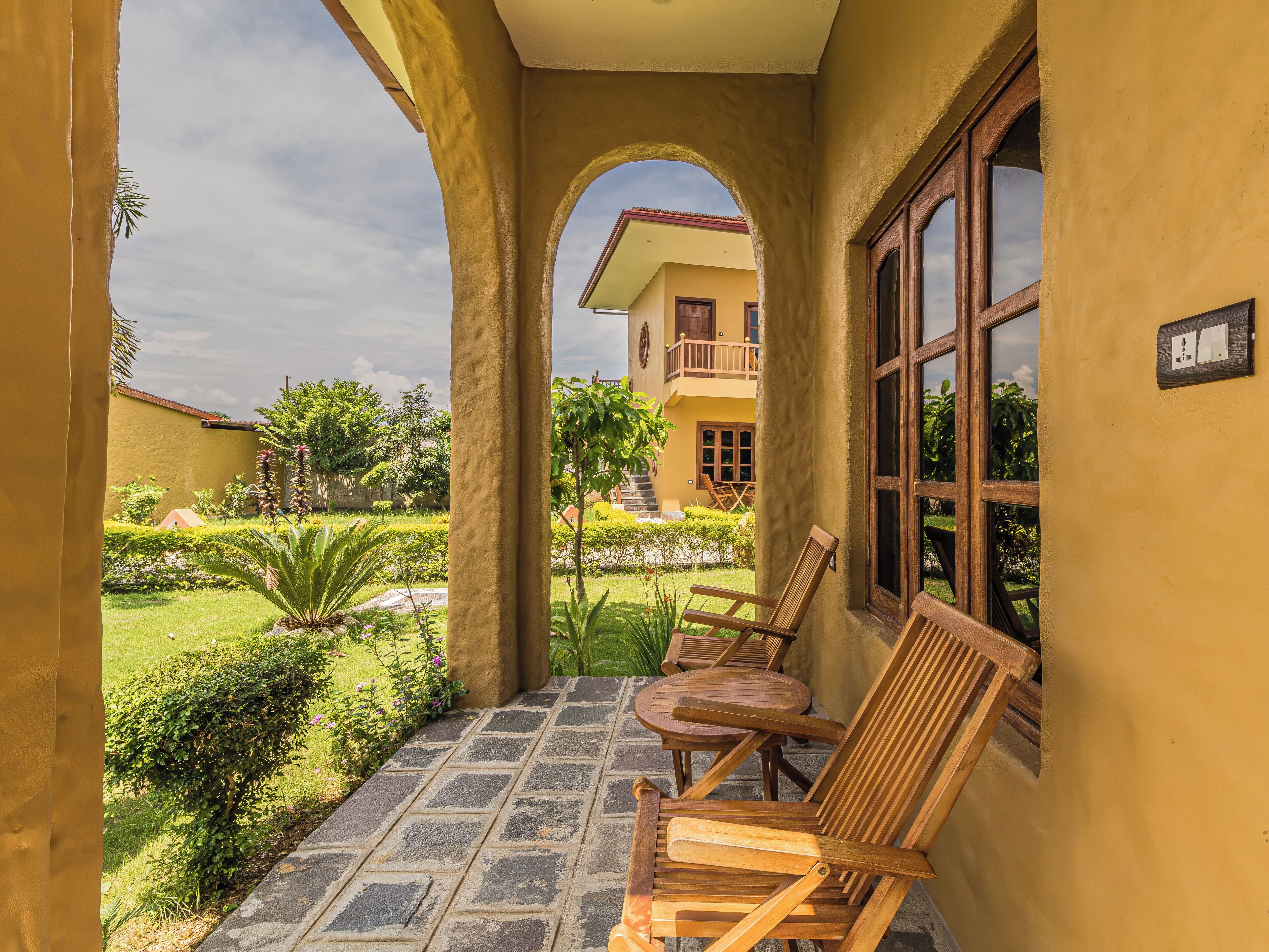 Deluxe Triple Room, Garden View | Terrace/patio