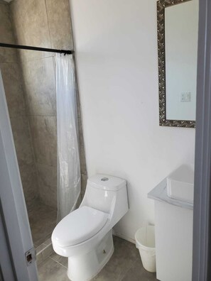 Hair dryer, towels, soap, toilet paper