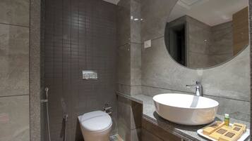 Separate bathtub and shower, hair dryer, slippers, towels