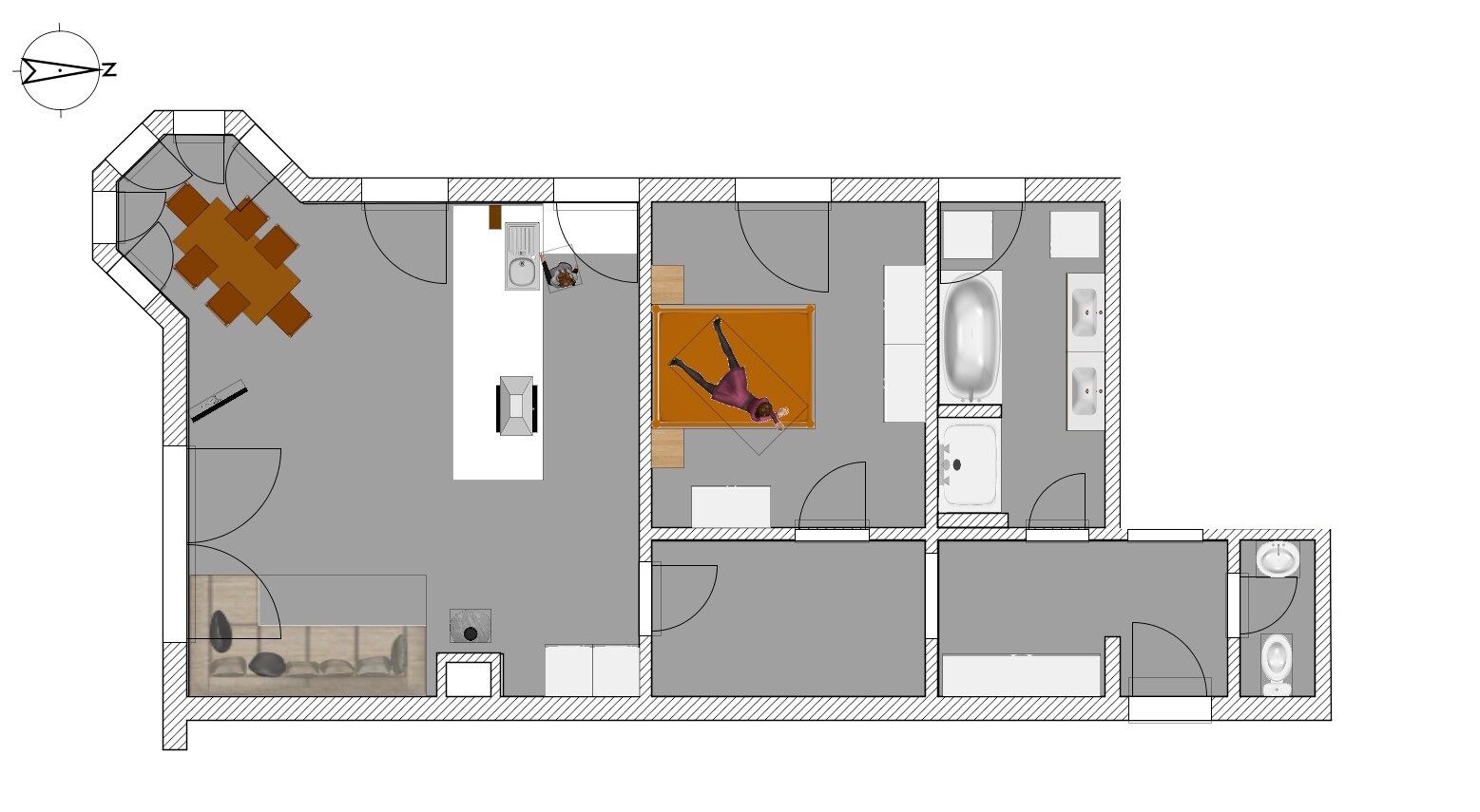 Un plan d’étage d’un hôtel comprenant un espace repas, une salle de bain et une cuisine.