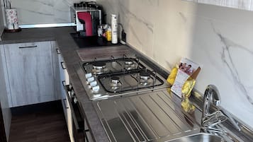 Deluxe-Apartment, Balkon, Bergblick (Faggio) | Eigene Küche | Kühlschrank, Mikrowelle, Ofen, Herdplatte