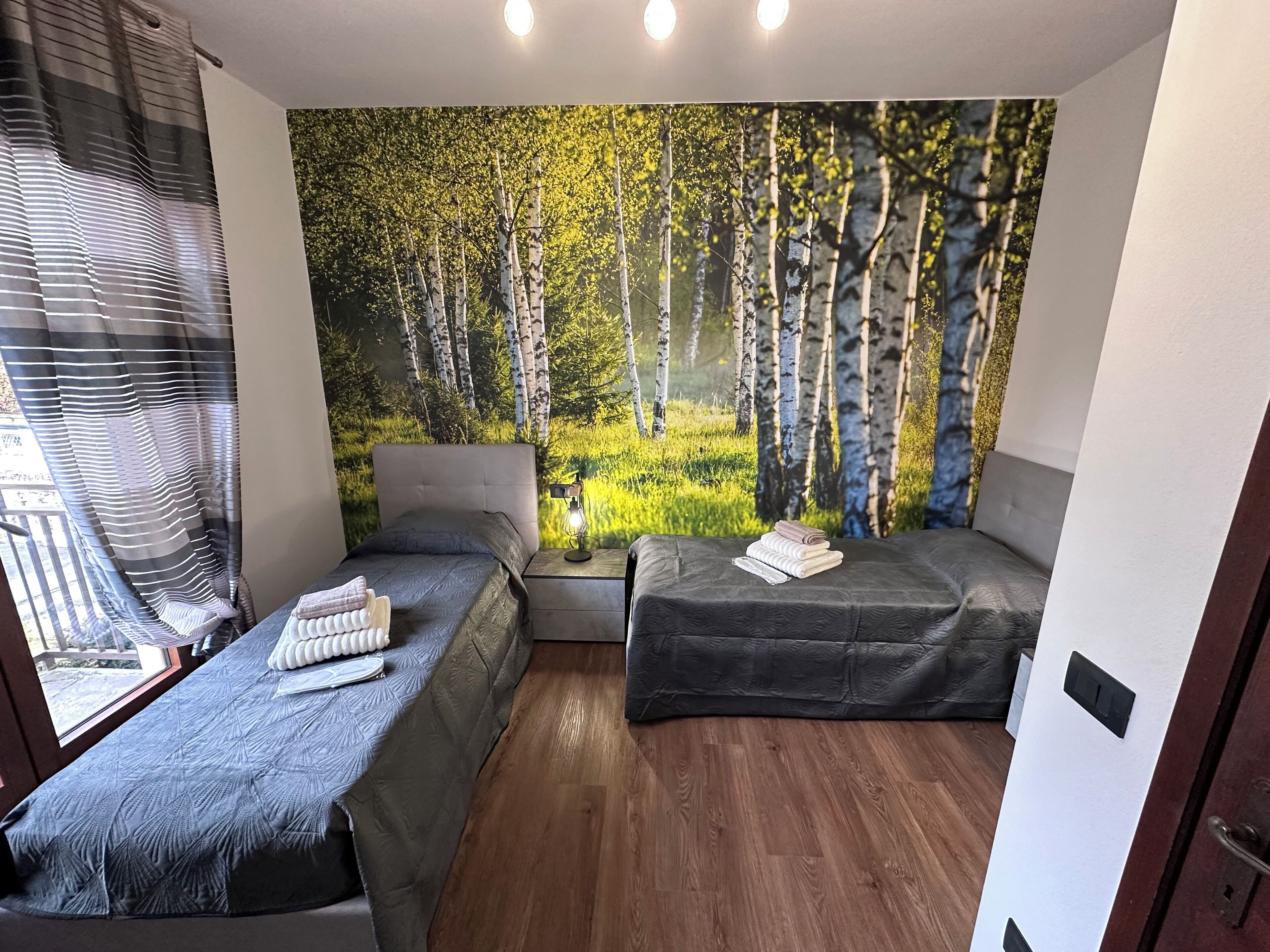 Departamento Deluxe, balcón, vista a la ciudad (Betulla) | Ropa de cama de alta calidad, edredón y camas con efecto memoria 