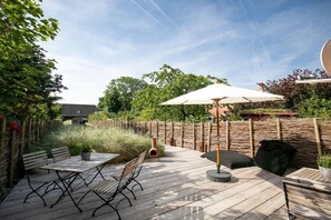 Outdoor dining - Luxurious holiday home Room No. 35 (Tating)