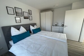 2 عدّة غرف نوم وواي فاي مجانًا وملاءات أسرّة