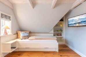 2 habitaciones, tabla de planchar con plancha y cuna de viaje 