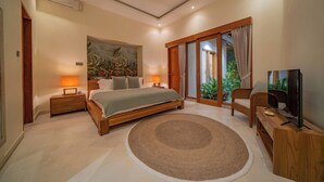 A bedroom with a bed, nightstands, a television, and a large window with curtains. - Luxury Balinese style villa with AC in Seminyak- 5BR for ultimate relaxation (Bali)