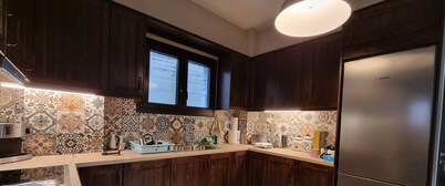 The Black Chestnut, a stone built luxury house in the village of Agios Nikolaos.